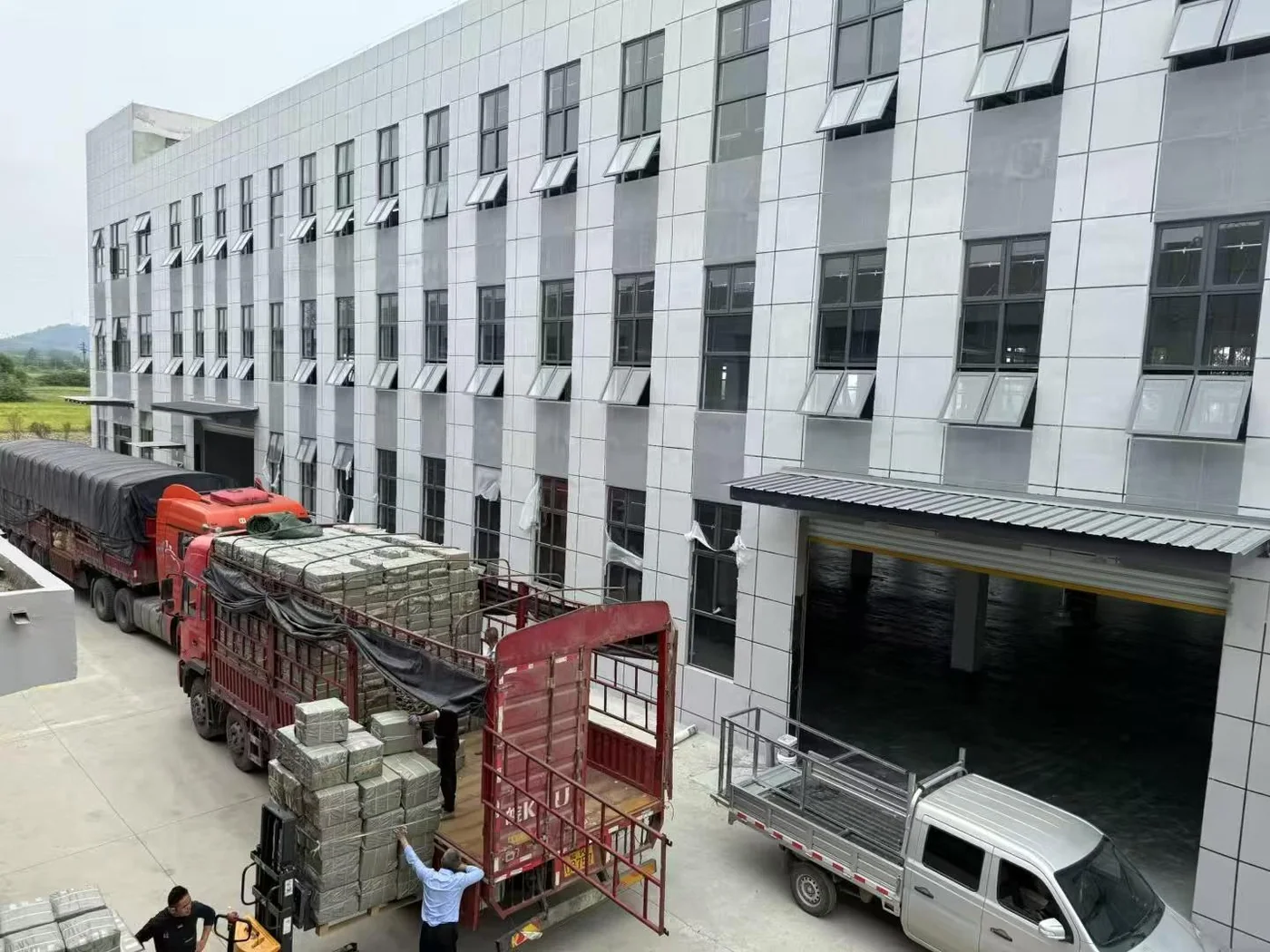 Ark Umbrella factory building exterior with loading area for bulk umbrella shipments