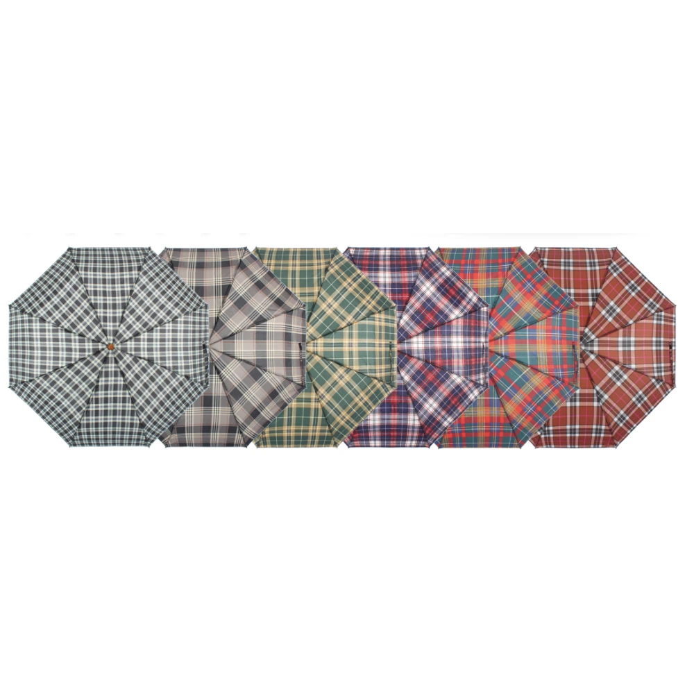 Six open umbrella canopies in different plaid colorways